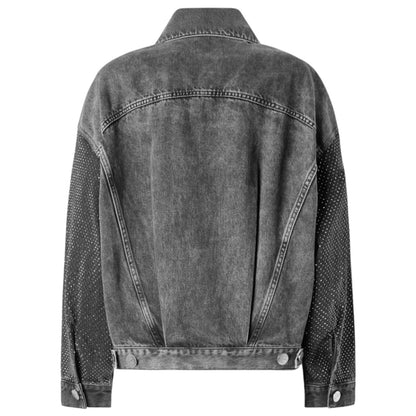 Giubbino trucker in denim con mini borchie